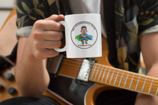 mockup of a musician holding an 11 oz coffee mug 33324